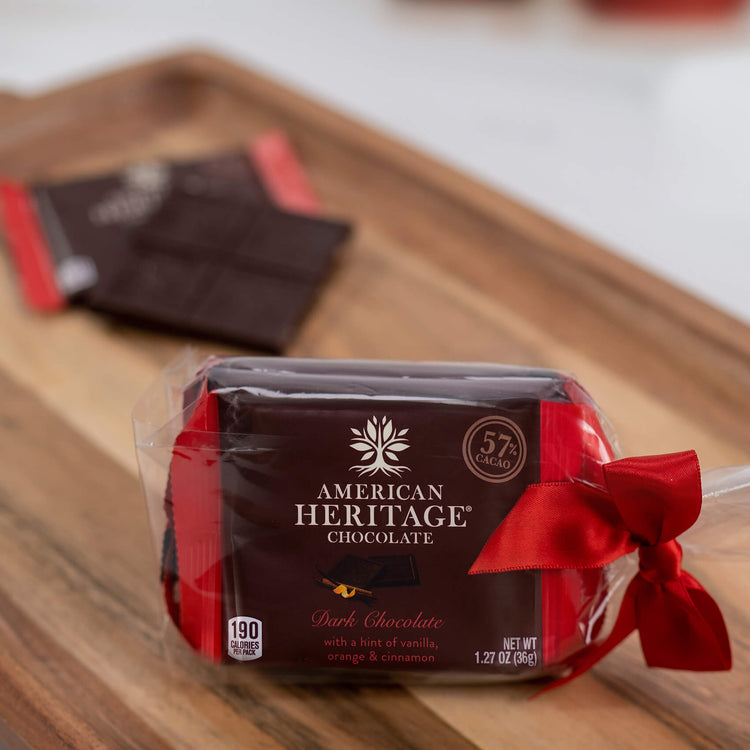 AMERICAN HERITAGE Chocolate Tablet Bars - Lifestyle image of 4 pack of bars on a wooden table