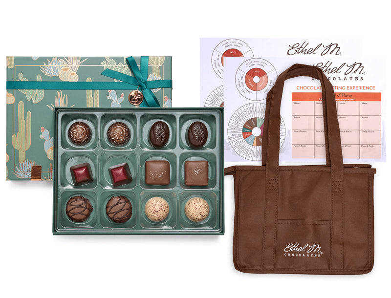 Ethel M Chocolates Nut-Free Private Online Tasting Kit. Image shows twelve pieces of nut-free chocolate in a cactus-patterned gift box, Tasting Mats, and Insulated Tote Bag.