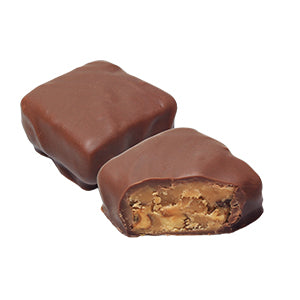 Milk Chocolate Pecan Toffee Crisp Piece Cross-Section Showing the piece cut in half and the soft center.