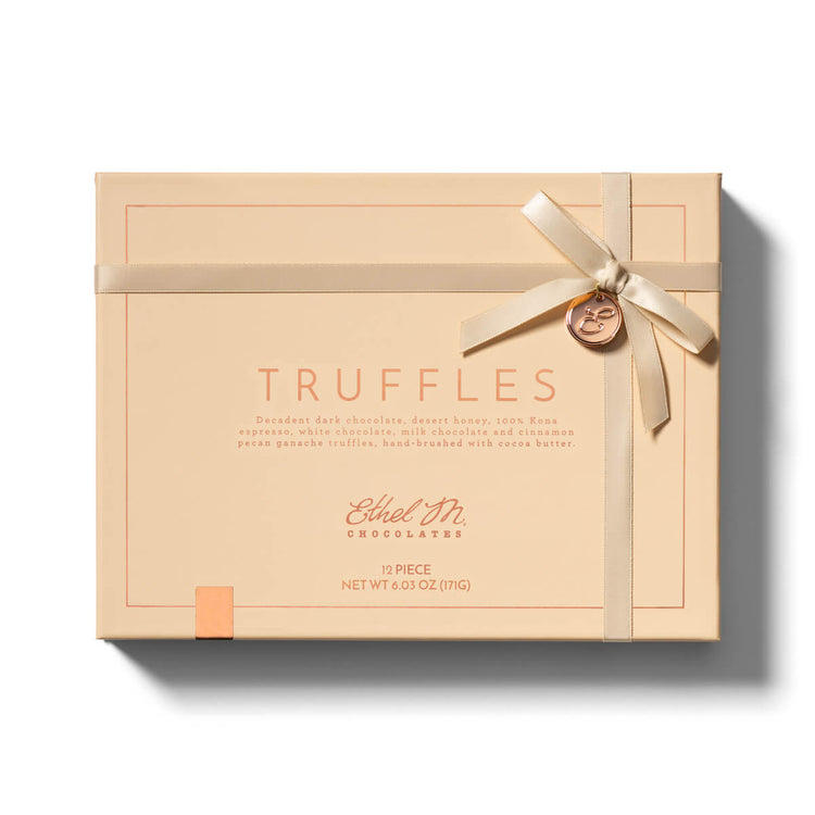 Ethel M Chocolates 12-piece Truffles Collection Lifestyle Closed Box Image - Shows the outside design of the box.