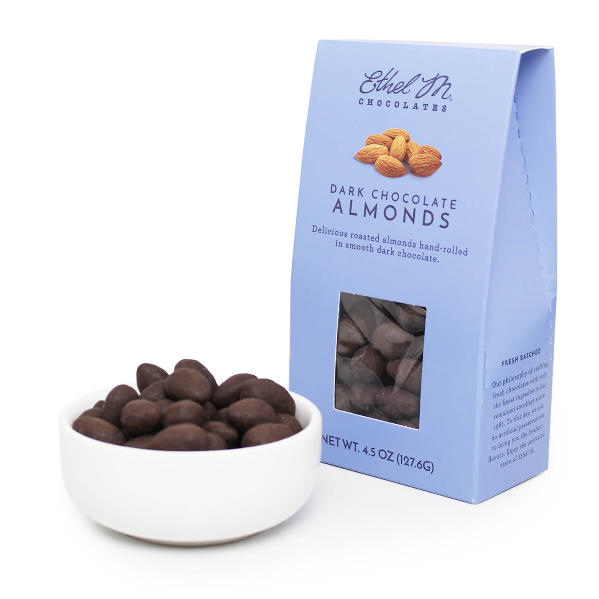 Ethel M Chocolates Dark Chocolate Covered Almonds Lifestyle Image Showing the Chocolate Covered Almonds in a white dish.
